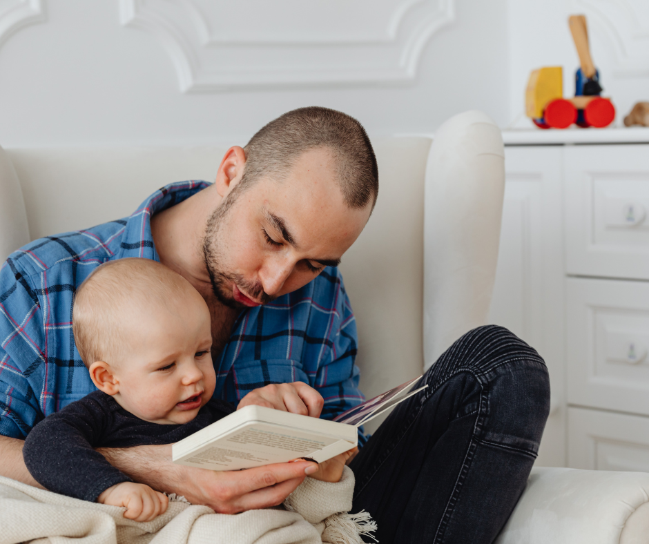 Dad and baby reading