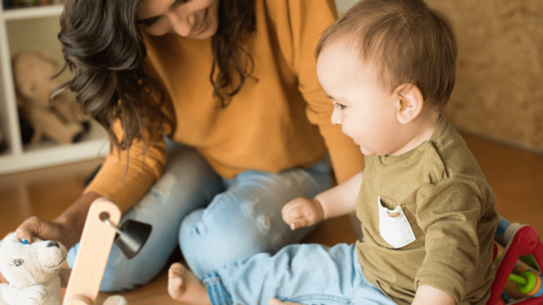 Mom and baby use play therapy to develop speech and language